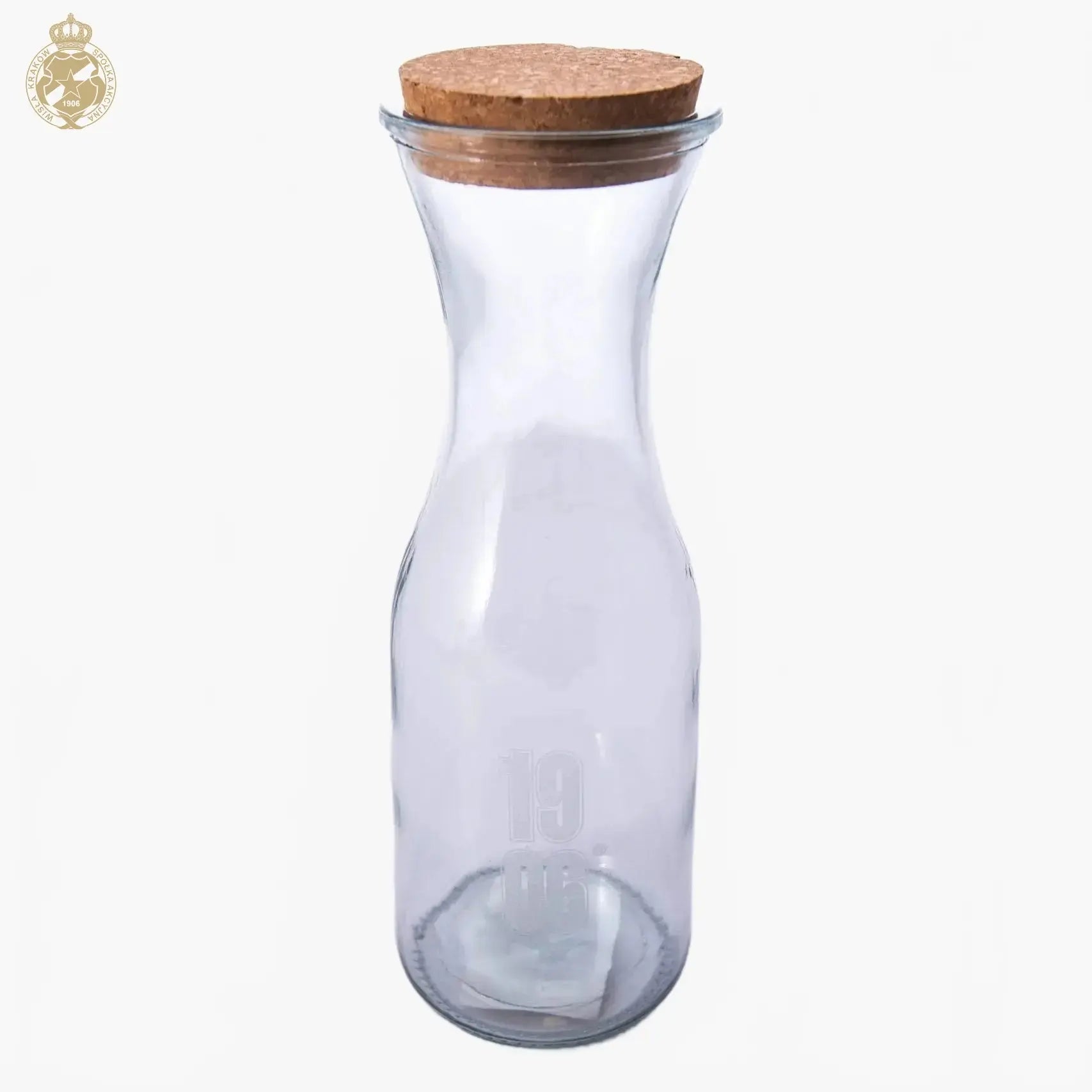 Clear glass carafe with a cork lid on a white background